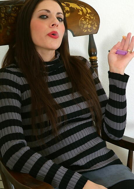 Very attractive mature Dahlia unveils small tits and spreads her legs 